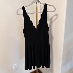 Black Romper with Scallop Detail